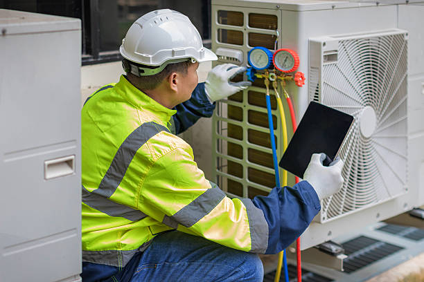 Professional Hvac technician working in Hemet, CA